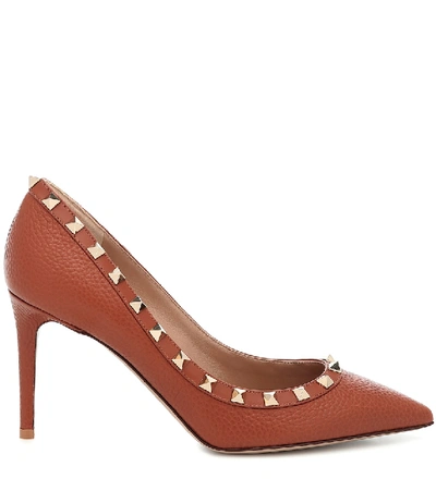 Shop Valentino Rockstud Leather Pumps In Brown