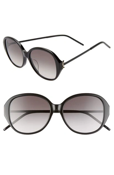Shop Saint Laurent 57mm Round Sunglasses In Shiny Black/ Smoke Gradient