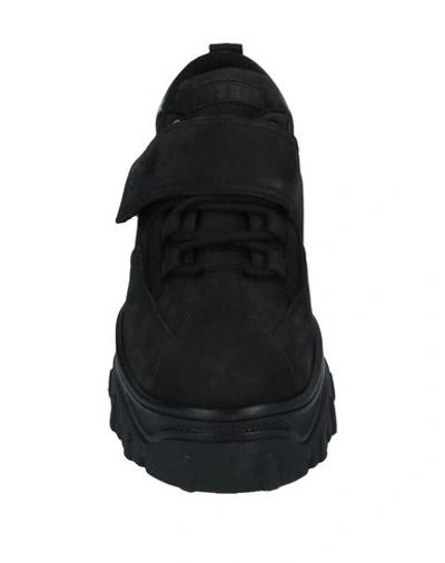 Shop Msgm Sneakers In Black