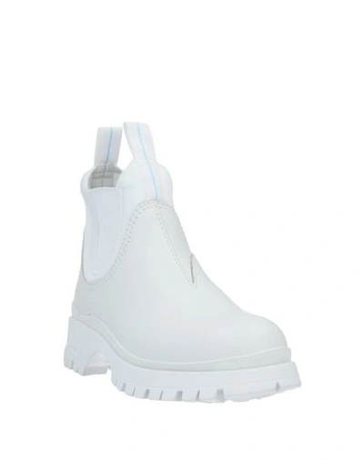Shop Prada Ankle Boots In White