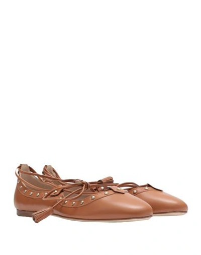 Tod's Ballet Flats In Brown