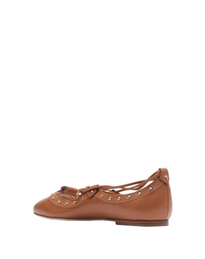 Tod's Ballet Flats In Brown