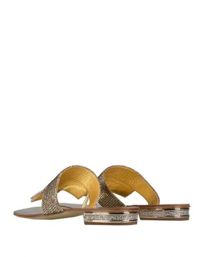 Shop Casadei Flip Flops In Gold