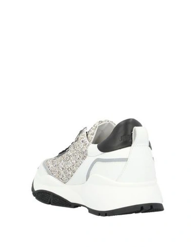 Shop Jimmy Choo Sneakers In White