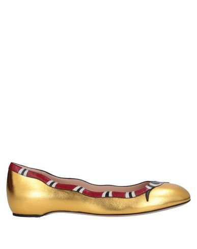 gold gucci flats