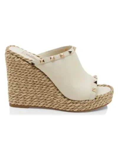 Shop Valentino Rockstud Torchon Leather Wedge Mules In Light Ivory
