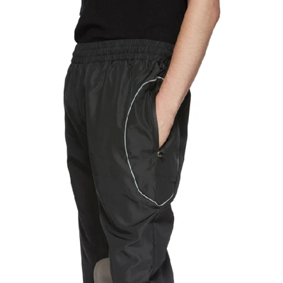 Shop All In Black And Brown Xp Track Pants In Black/brown