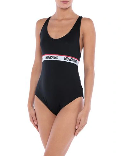 Shop Moschino Bodysuits In Black