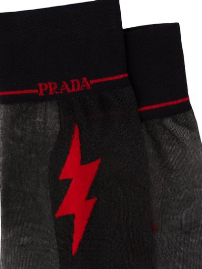 Shop Prada Graphic Print Sheer Detail Socks In F0n98 Black/red