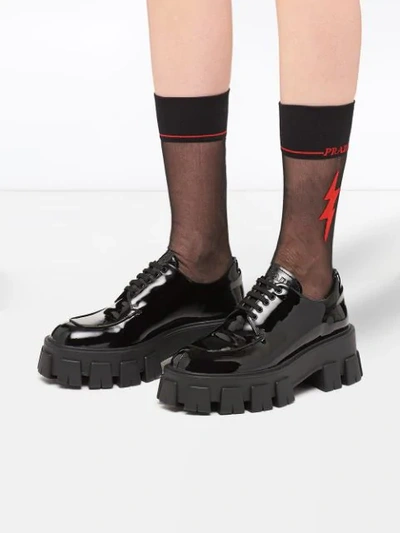 Shop Prada Graphic Print Sheer Detail Socks In F0n98 Black/red