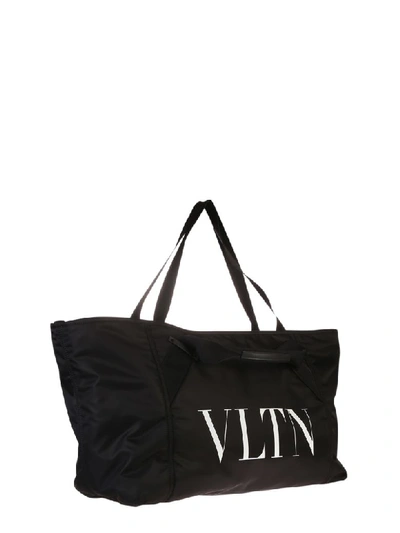 Shop Valentino Branded Duffle Bag In Black