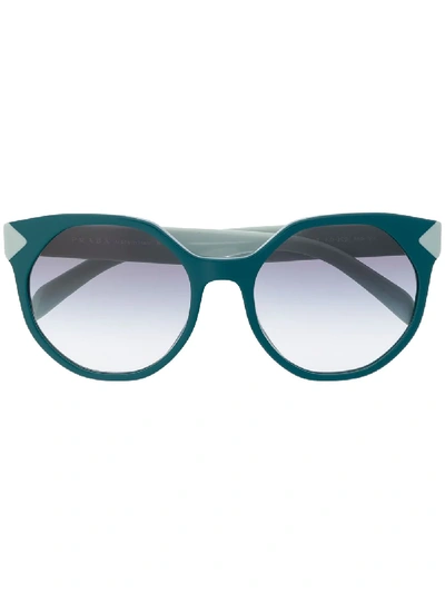 Shop Prada Oversized Cat Eye Sunglasses In 蓝色