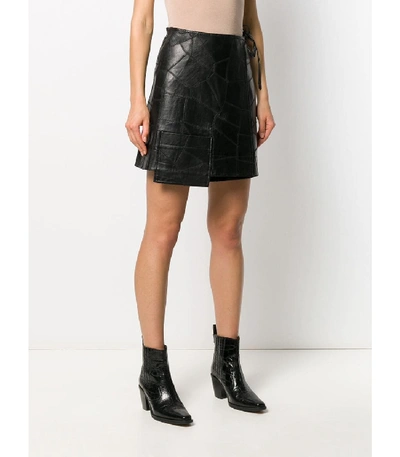 Shop Ganni Patch Leather Mini Wrap Skirt In Black