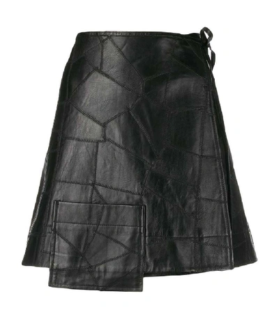 Shop Ganni Patch Leather Mini Wrap Skirt In Black