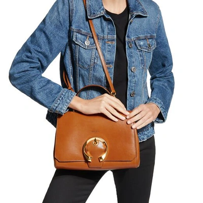 Shop Jimmy Choo Madeline Top Handle Cuoio Calf Leather Top Handle Bag With Metal Buckle