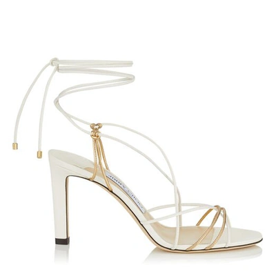 Shop Jimmy Choo Tao 85 Latte And Metallic Gold Nappa Leather Sandal With Spaghetti Straps In Latte/gold