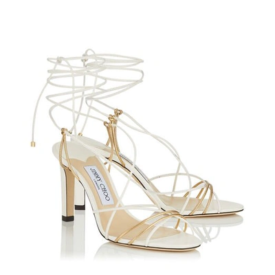 Shop Jimmy Choo Tao 85 Latte And Metallic Gold Nappa Leather Sandal With Spaghetti Straps In Latte/gold