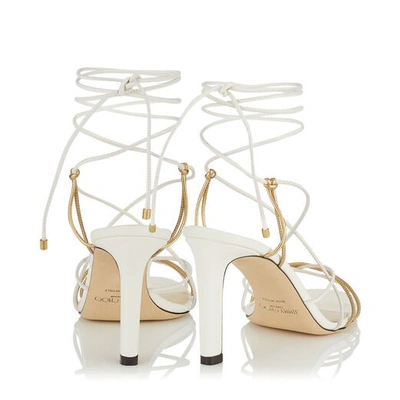 Shop Jimmy Choo Tao 85 Latte And Metallic Gold Nappa Leather Sandal With Spaghetti Straps In Latte/gold