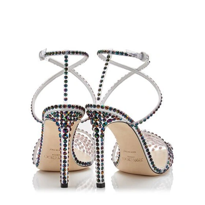 Shop Jimmy Choo Tamai 100 Clear Plexi Heels With Horizontal Straps And Petrol Hotfix Crystals In Clear/petrol