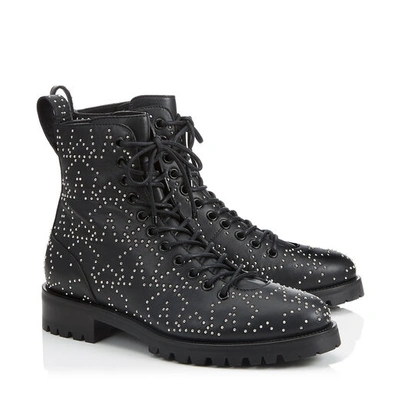 Shop Jimmy Choo Cruz Flat Black And Silver Star Leather Combat Boot With Mini Studs In Black/silver