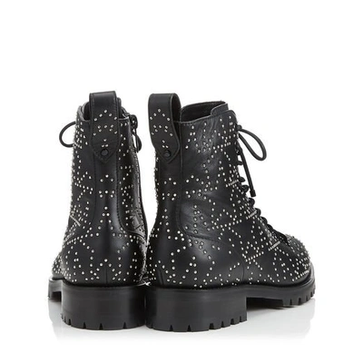 Shop Jimmy Choo Cruz Flat Black And Silver Star Leather Combat Boot With Mini Studs In Black/silver
