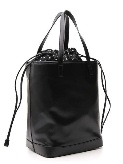 Shop Saint Laurent Teddy Logo Drawstring Tote Bag In Black