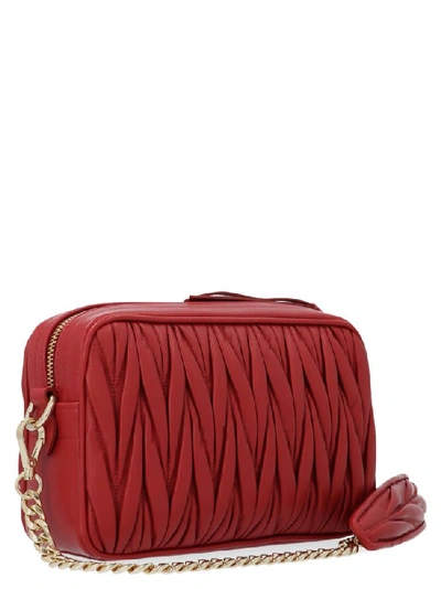Shop Miu Miu Bandoliera Matelassé Shoulder Bag In Red