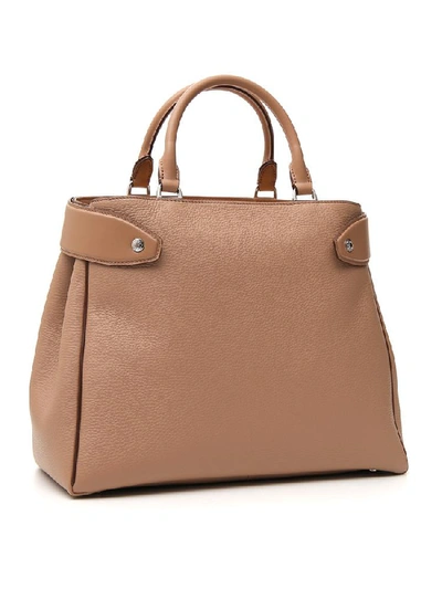 Shop Tod's Wave Medium Top Handle Bag In Brown