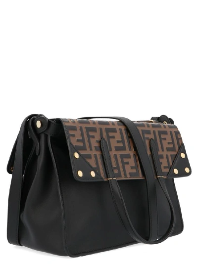 Shop Fendi Logo Embossed Flip Shoulder Bag In Black
