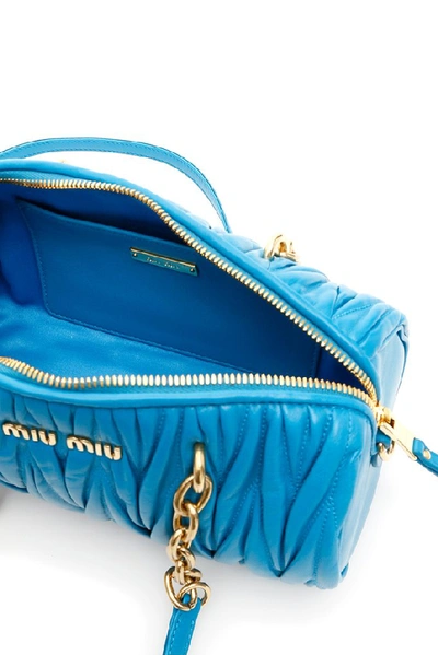 Shop Miu Miu Matelassé Logo Shoulder Bag In Blue
