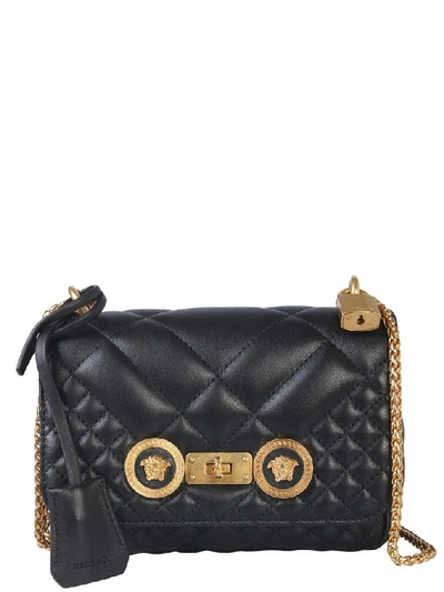 Shop Versace Quilted Logo Embossed Shoulder Bag In Black