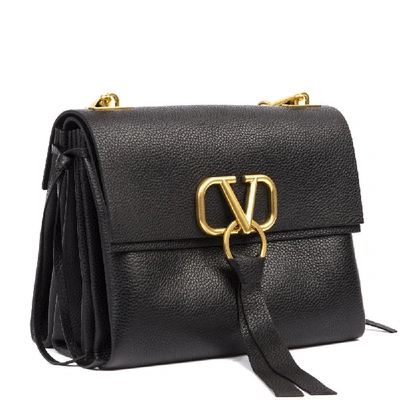 Shop Valentino Garavani Vring Logo Embossed Shoulder Bag In Black