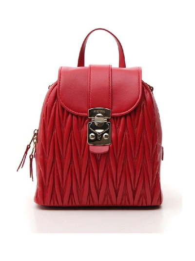 Shop Miu Miu Matelassé Foldover Backpack In Red
