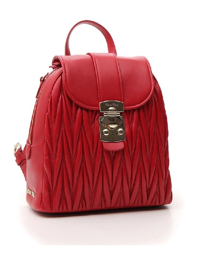 Shop Miu Miu Matelassé Foldover Backpack In Red
