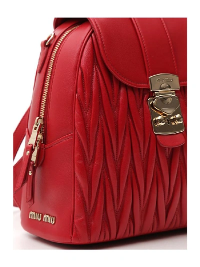 Shop Miu Miu Matelassé Foldover Backpack In Red