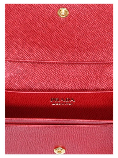 Shop Prada Saffiano Logo Foldover Cardholder In Red