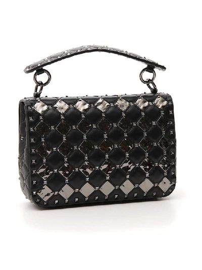 Shop Valentino Garavani Rockstud Metallic Detail Shoulder Bag In Black