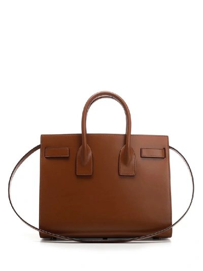 Shop Saint Laurent Logo Top Handle Tote Bag In Brown