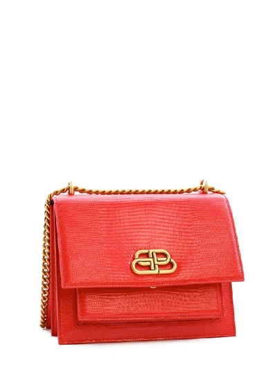 Shop Balenciaga Bb Logo Embossed Shoulder Bag In Red