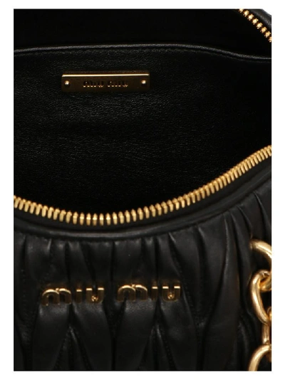 Shop Miu Miu Bauletto Quilted Shoulder Bag In Black