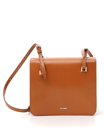 Shop Jil Sander Foldover Logo Shoulder Bag In Brown