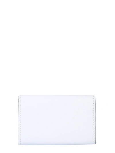 Shop Moschino Logo Print Leather Wallet In White