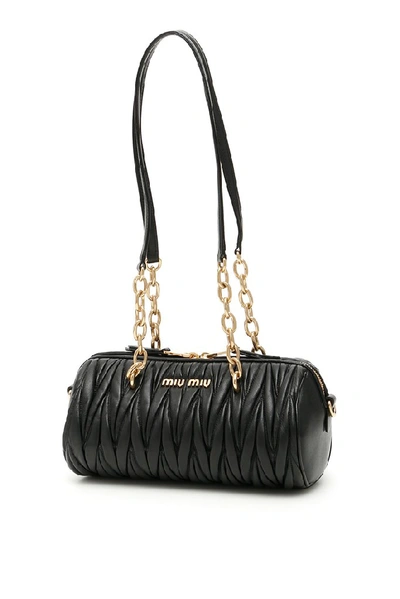 Shop Miu Miu Matelassé Logo Shoulder Bag In Black