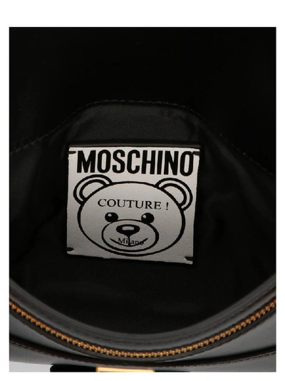 Shop Moschino Teddy Logo Envelope Clutch In Black