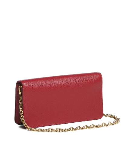 Shop Prada Saffiano Chain Clutch Bag In Red