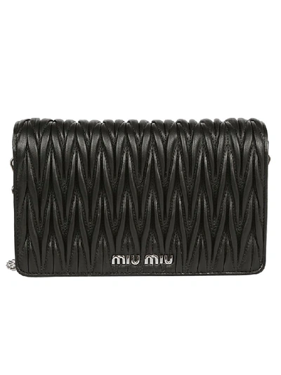 Shop Miu Miu Matelassé Shoulder Bag In Black