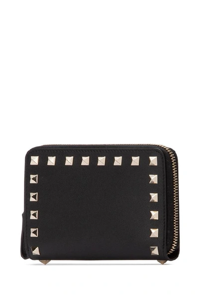 Shop Valentino Garavani Rockstud Zipped Wallet In Black