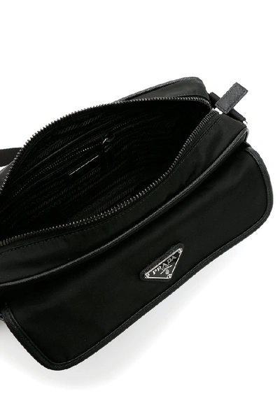 Shop Prada Saffiano Logo Messenger Bag In Black