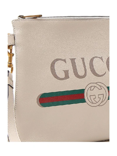 Shop Gucci Logo Printed Clutch Bag In White