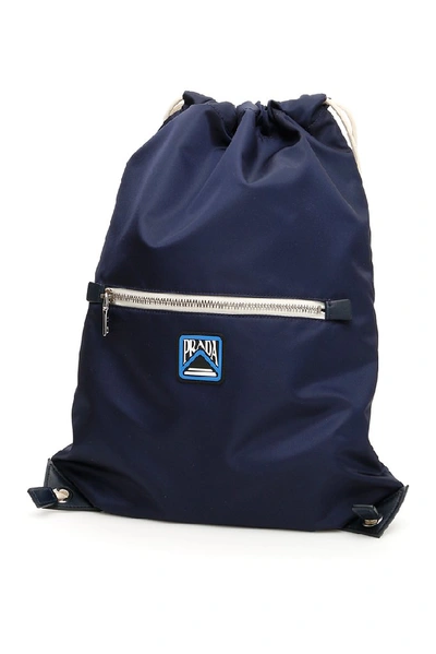 Shop Prada Drawstring Zipped Backpack In Blue